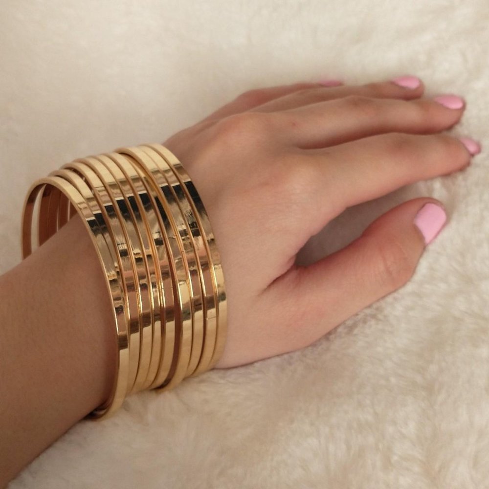 Set of 10 Gold Toned Skinny Bangles